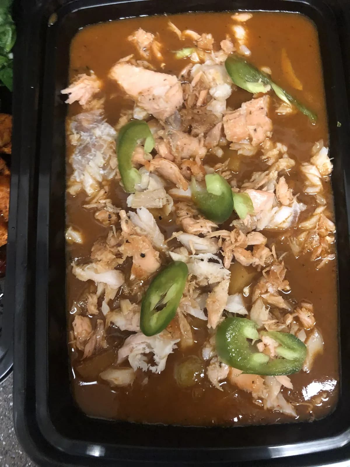 Savory meal plan with rice, jalapenos, and sauce